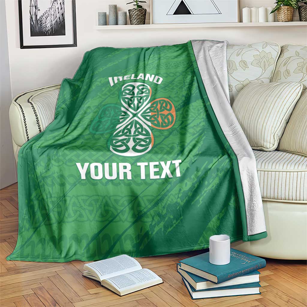 Green Ireland cricket blanket with Celtic knot emblem and custom text across the center.