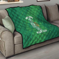 Green Ireland quilt blanket draped on a sofa with Celtic knot emblem and “YOUR TEXT”