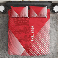 Red duvet cover and two pillowcases with diagonal stripes and 'YOUR TEXT' print