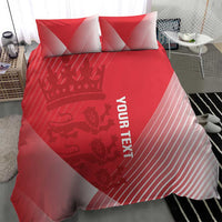Red duvet cover with crown and icon graphics, diagonal stripes, and 'YOUR TEXT' on bed