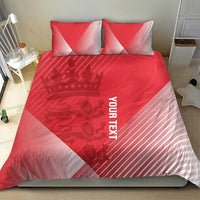 Red duvet cover with crown graphic, striped side panels, and 'YOUR TEXT' on bed