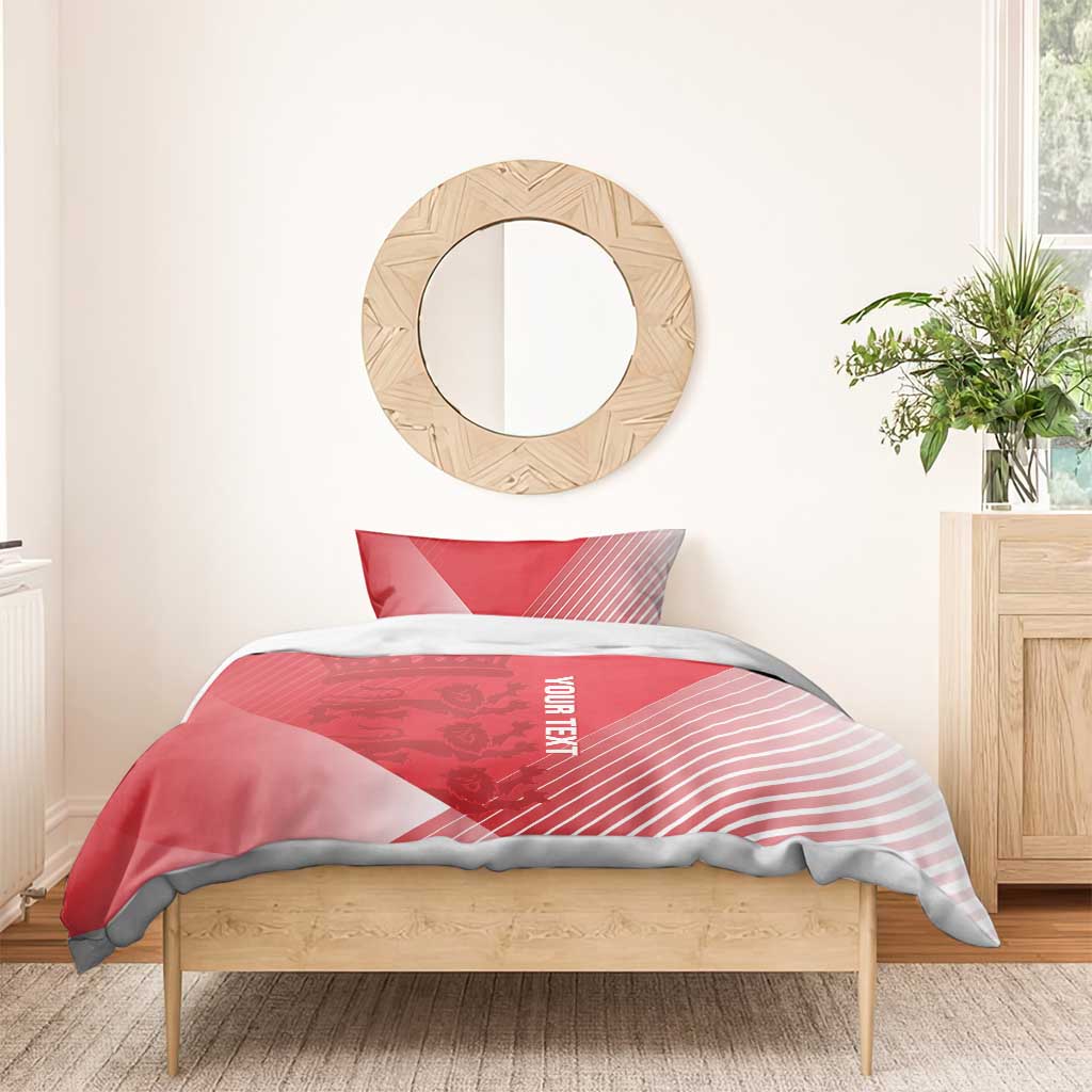 Red duvet cover with 'YOUR TEXT' and diagonal stripes on bed with two pillowcases