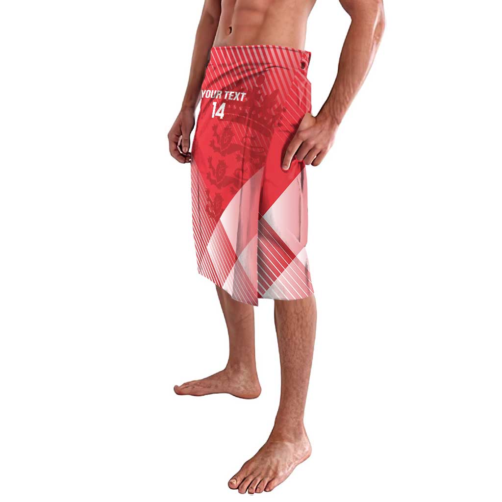 Red patterned lavalava shorts with 'YOUR TEXT 14' print and elastic waistband