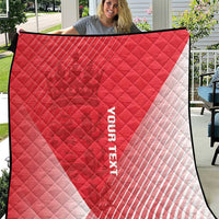 Red and white diagonal sports quilt with diamond quilting and black edge trim