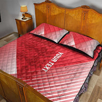 Red quilt bed set with white stripes, black-trim pillows, 'YOUR TEXKY' lettering