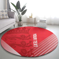 Red round cricket rug with 'YOUR TEXT' vertical print and diagonal white stripes