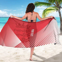 Red cricket sarong with white diagonal stripes, logo panel, draped wrap