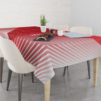 Red tablecloth with pink striped chevron pattern across the tabletop edges.