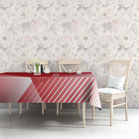 Red and pink striped tablecloth on a rectangular dining table, styled for meals.