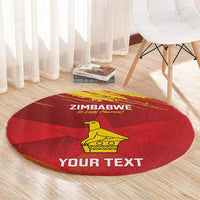 Red round carpet with Zimbabwe chevrons, yellow bird icon and centered 'YOUR TEXT'.