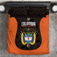 Black and orange football-themed bedding set with crest and graphic logo panel