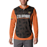 Orange and black football button sweatshirt on model, front Colombia graphic