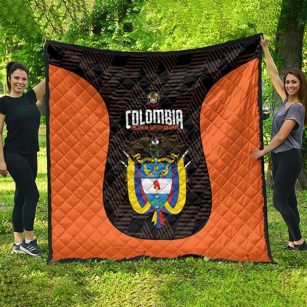 Orange and black Colombia football quilt with central crest graphic and quilted texture