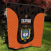 Orange and black quilt with U-shaped center panel, Colombia crest, and quilted sides