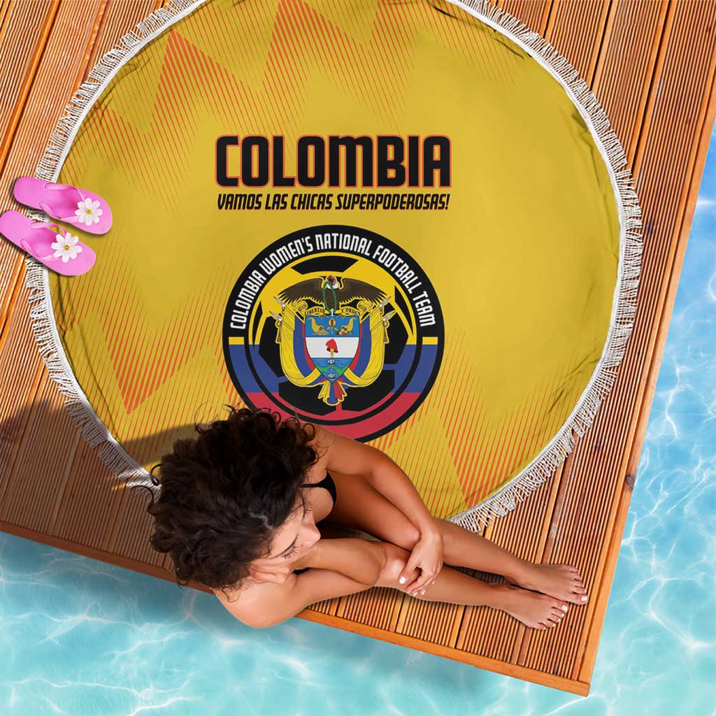Yellow round beach blanket with white fringe, Colombia crest on striped design