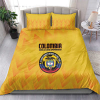 Yellow football bedding set with orange zigzag pattern, Colombia crest printed on duvet and pillowcases.