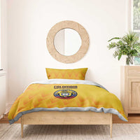 Yellow football bedding set with orange zigzag design and Colombia crest on the duvet front.
