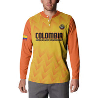 Yellow and orange button football sweatshirt on model, with Colombia front graphic