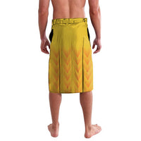 Yellow football shorts with elastic waistband, chevron pattern, back view