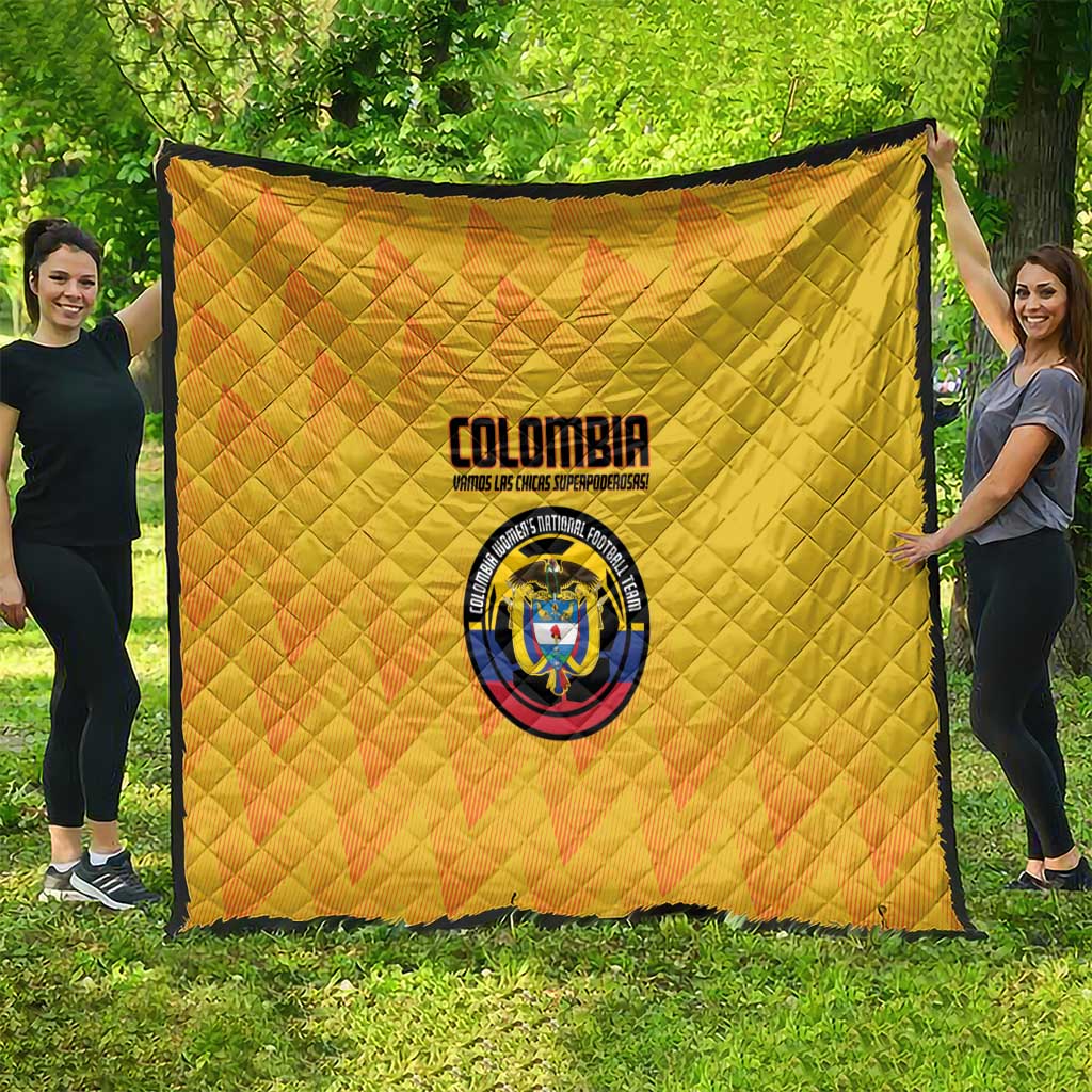 Yellow Colombia football quilt blanket with quilted texture, crest logo centered, black trim