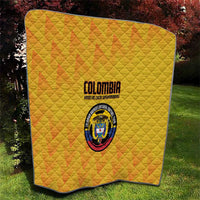 Yellow Colombia football quilt blanket with diamond stitching, Colombia text and crest logo