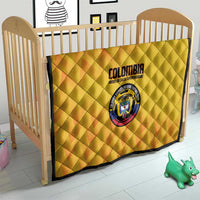 Yellow Colombia football quilt on crib, quilted diamond pattern with crest logo and text