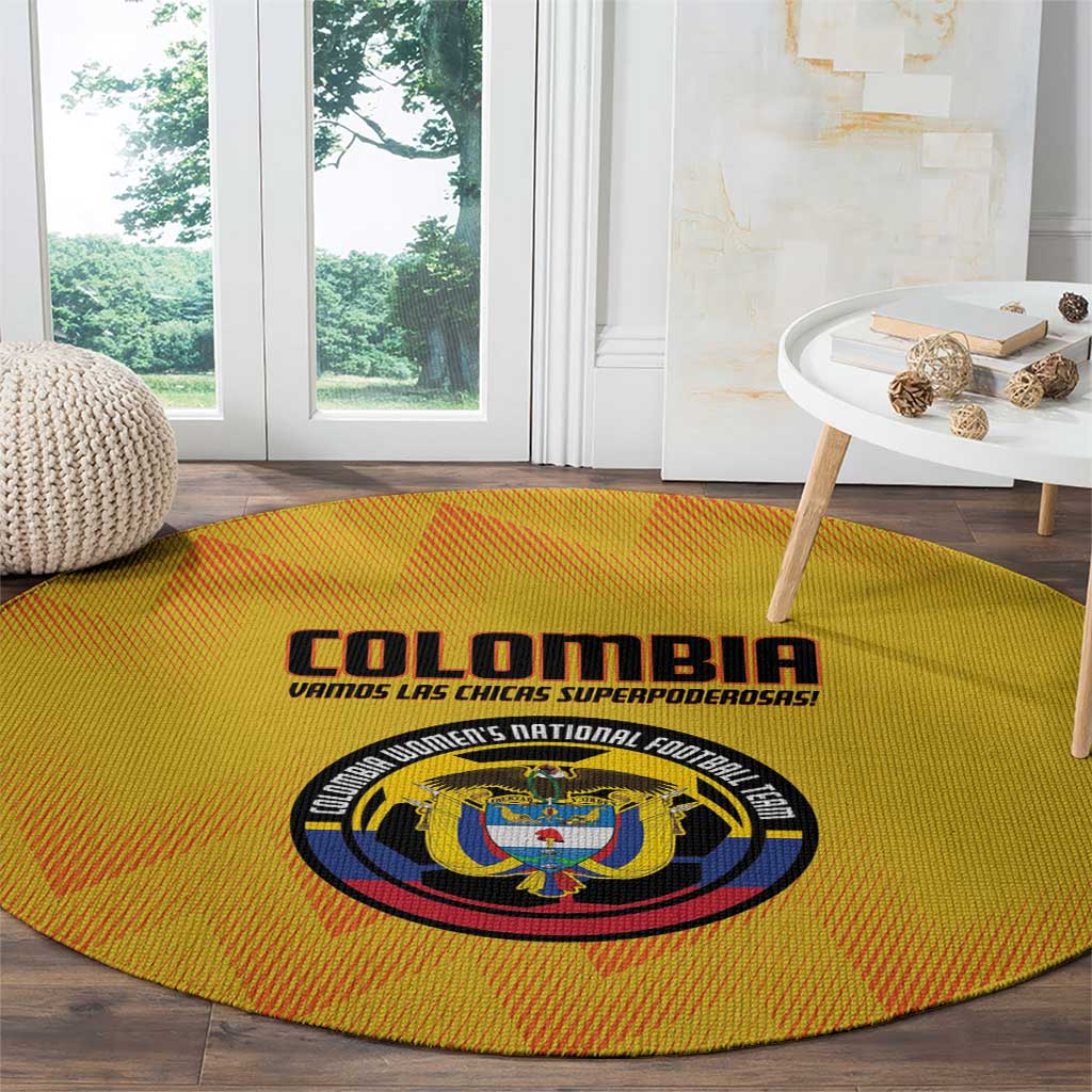 Yellow round football carpet with large Colombia wordmark and central crest logo.