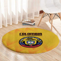 Yellow round Colombia football rug with central crest and curved printed title text.
