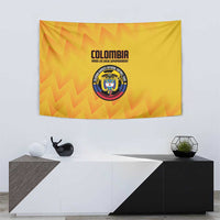 Yellow Colombia football tapestry with zigzag pattern and circular crest in the center