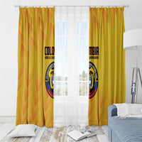 Two yellow Colombia football window curtain panels framing a white sheer window.