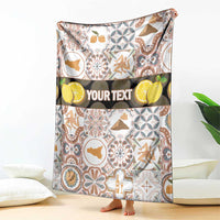 Personalized Sicilia blanket with colorful mosaic pattern and custom “YOUR TEXT” band