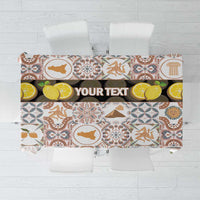 Personalized tablecloth with Sicilian mosaic motifs and "YOUR TEXT" banner, cream base