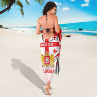 Georgia football sarong hanging down, red and white crest with “YOUR TEXT” and “GEORGIA”