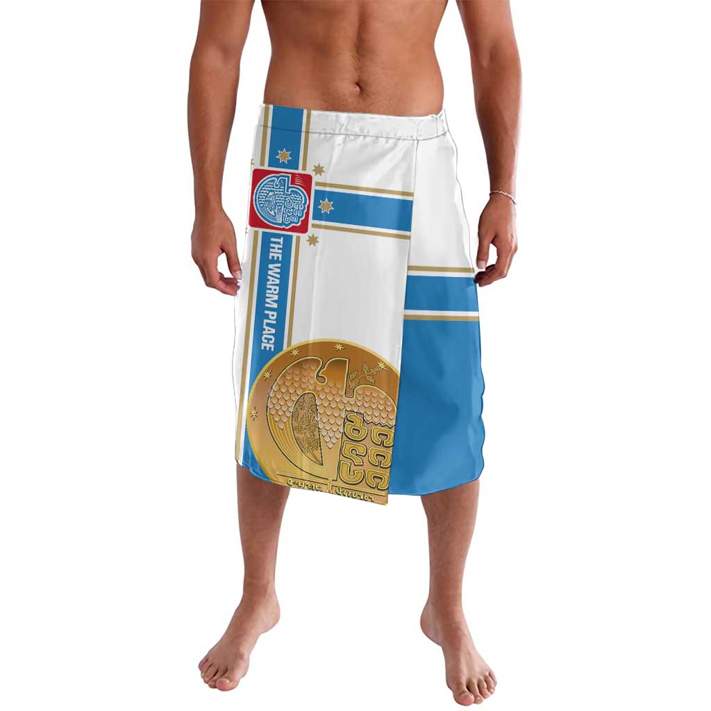 Flag-style lavalava shorts with white waistband, blue stripe, and gold emblem graphic