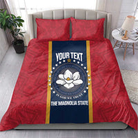Red bedding set with two pillows featuring a blue circular state emblem and gold trim
