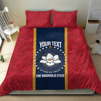 Red bed linen set with two pillows and blue emblem band framed by gold stripes