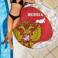 Round beach blanket held up, Russia wordmark and coat of arms with map print, fringed edge