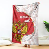 Russia flag-style blanket with crest and map, red center with white backing, pinned at corners