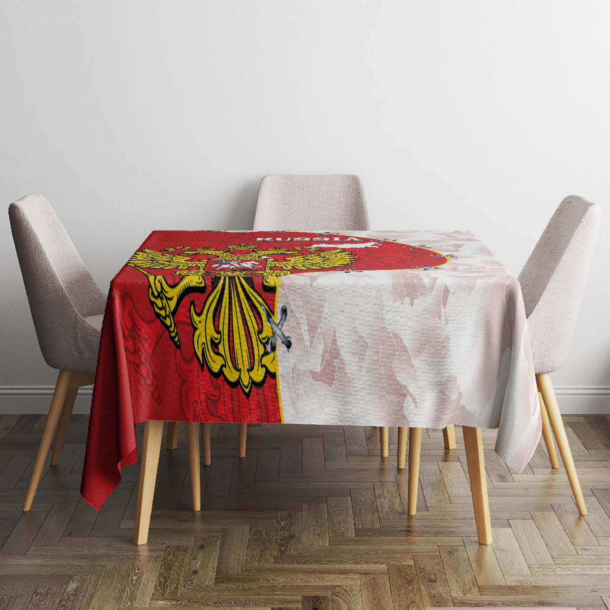 Red and white tablecloth with central crest and map-style pattern over tabletop
