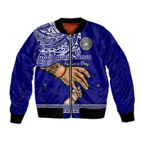 Blue bomber jacket with black ribbed trim and Father’s Day graphic on front