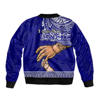 Blue bomber jacket with black ribbed trim and Dad graphic on back