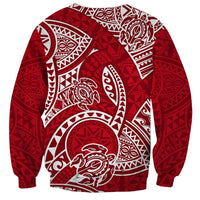 Red crewneck sweatshirt with large white tribal honu pattern, long sleeves