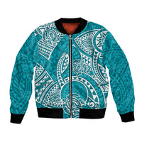 Turquoise bomber jacket with black ribbed collar, zipper, and white honu tribal print