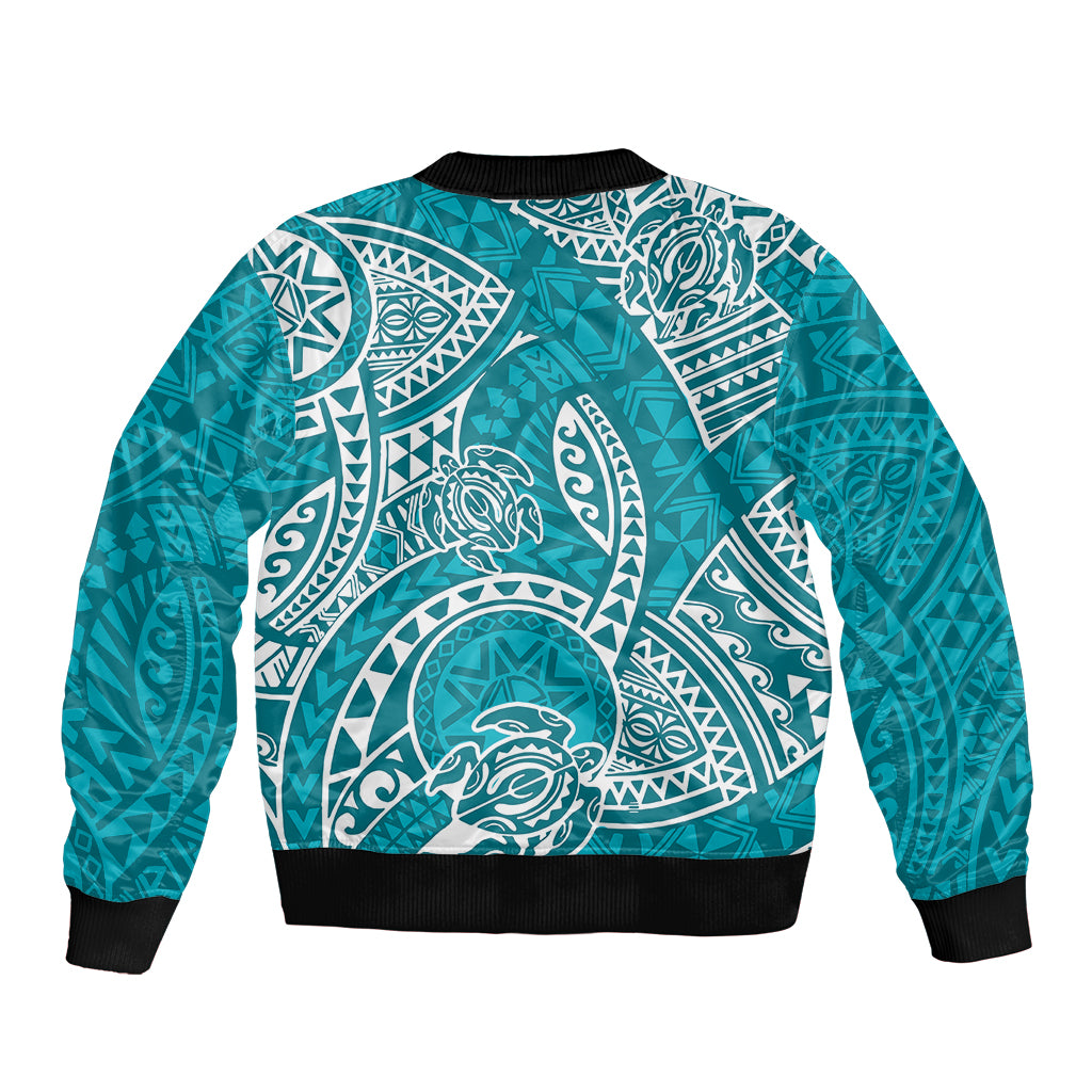 Turquoise bomber jacket with black hem and large white tribal honu graphic on back