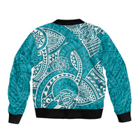 Turquoise bomber jacket with black hem and large white tribal honu graphic on back
