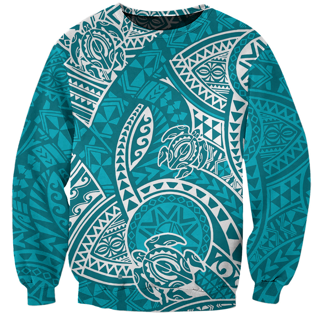 Turquoise crewneck sweatshirt with white honu and Polynesian tribal print, long sleeves