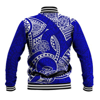 Blue baseball jacket back with large white tribal honu and tiki patterns, striped ribbed hem