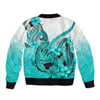 Turquoise gradient bomber jacket with large shark tattoo and plumeria flowers on back, zip front