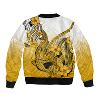 Unisex gold bomber jacket, back panel with Polynesian shark tattoo and plumeria flower art