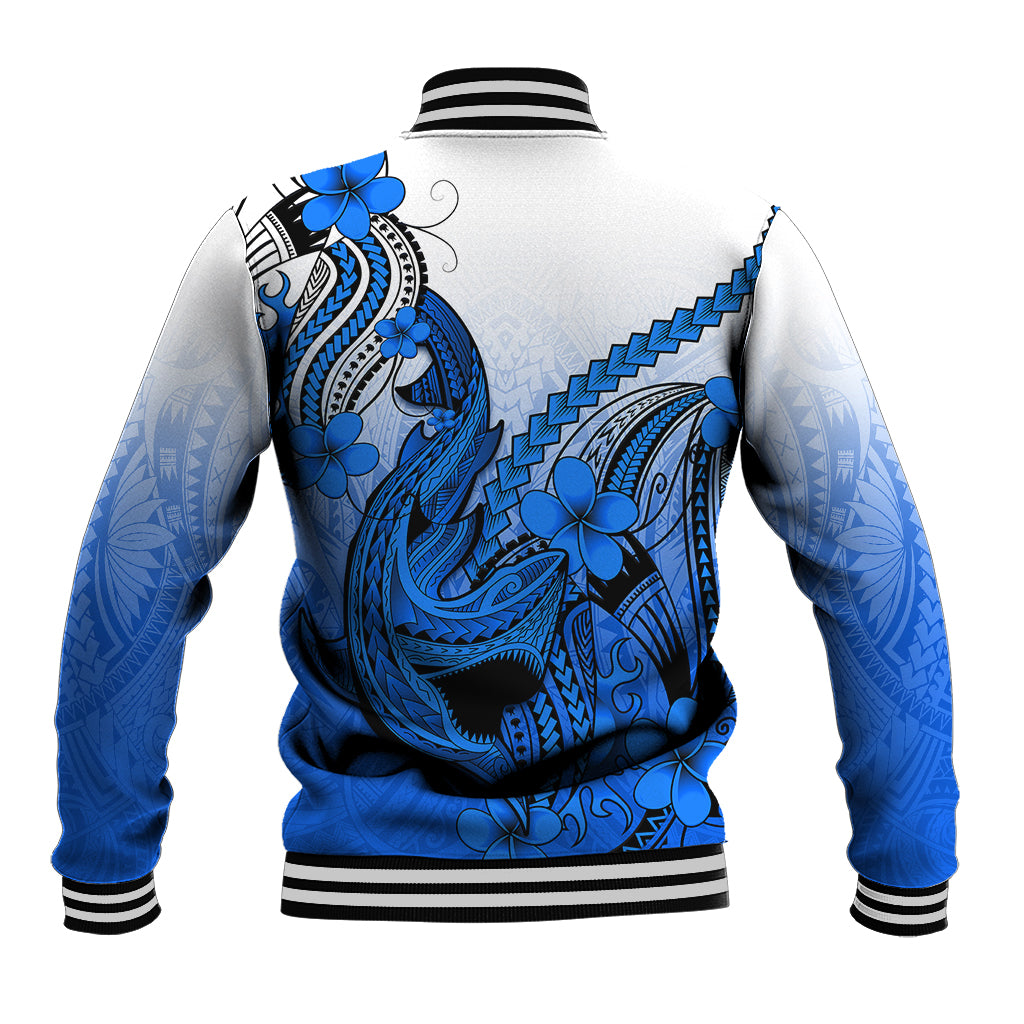 Blue-and-white baseball jacket, back panel shows blue shark tattoo with flower motifs, striped hem